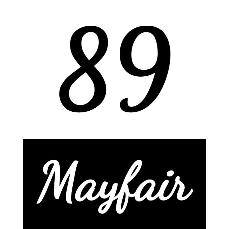 Black and white house number sign