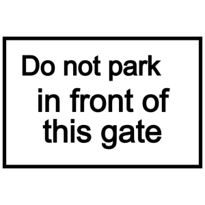 Do not park in front of this sign - white sign