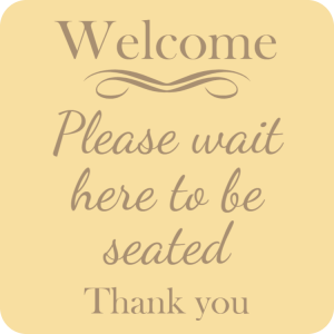 Wooden please wait to be seated sign